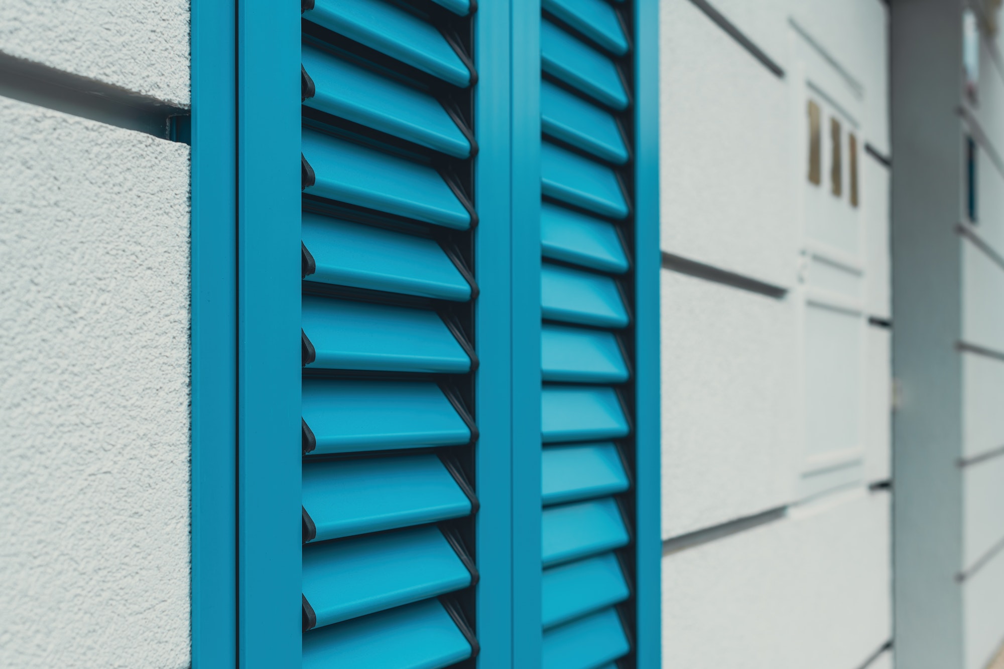 Aluminum shutters on windows