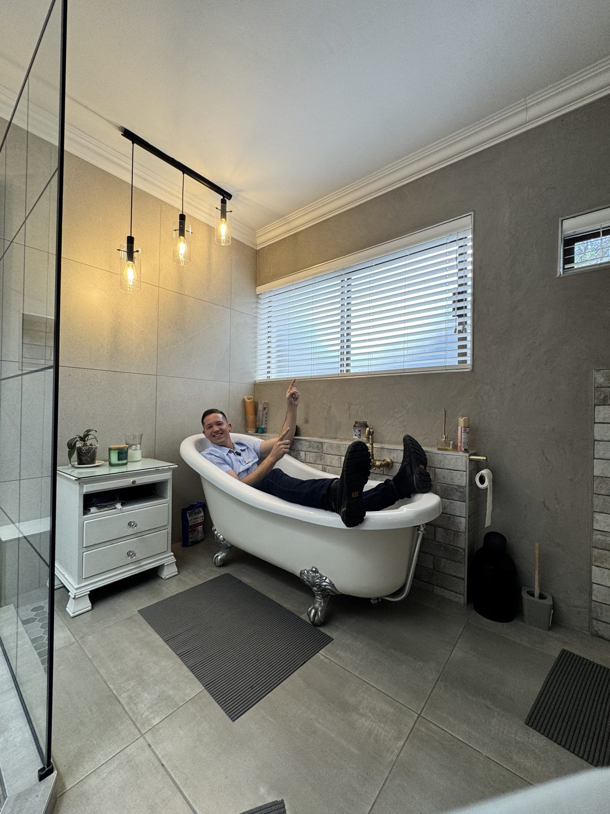 White Venetian blind professionally installed in a modern bathroom by Blind Concepts